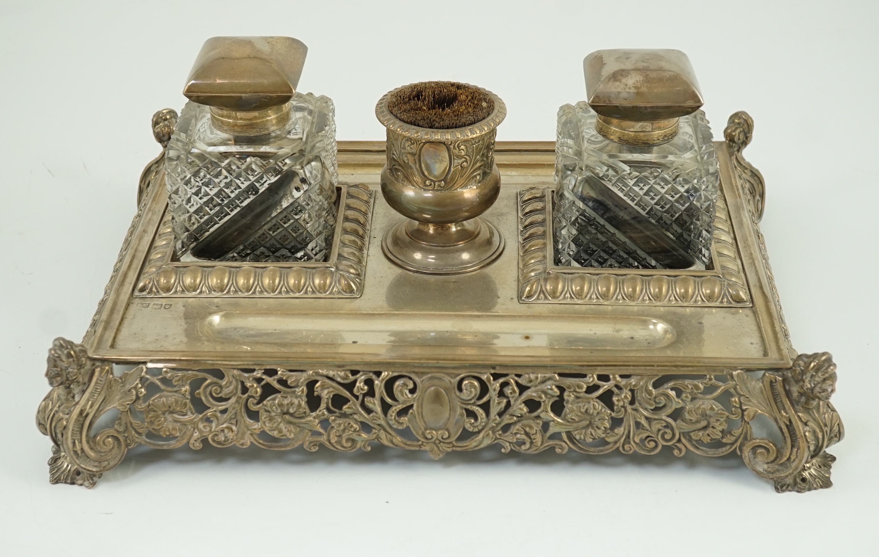 An ornate Edwardian silver rectangular inkstand, by Mappin & Webb